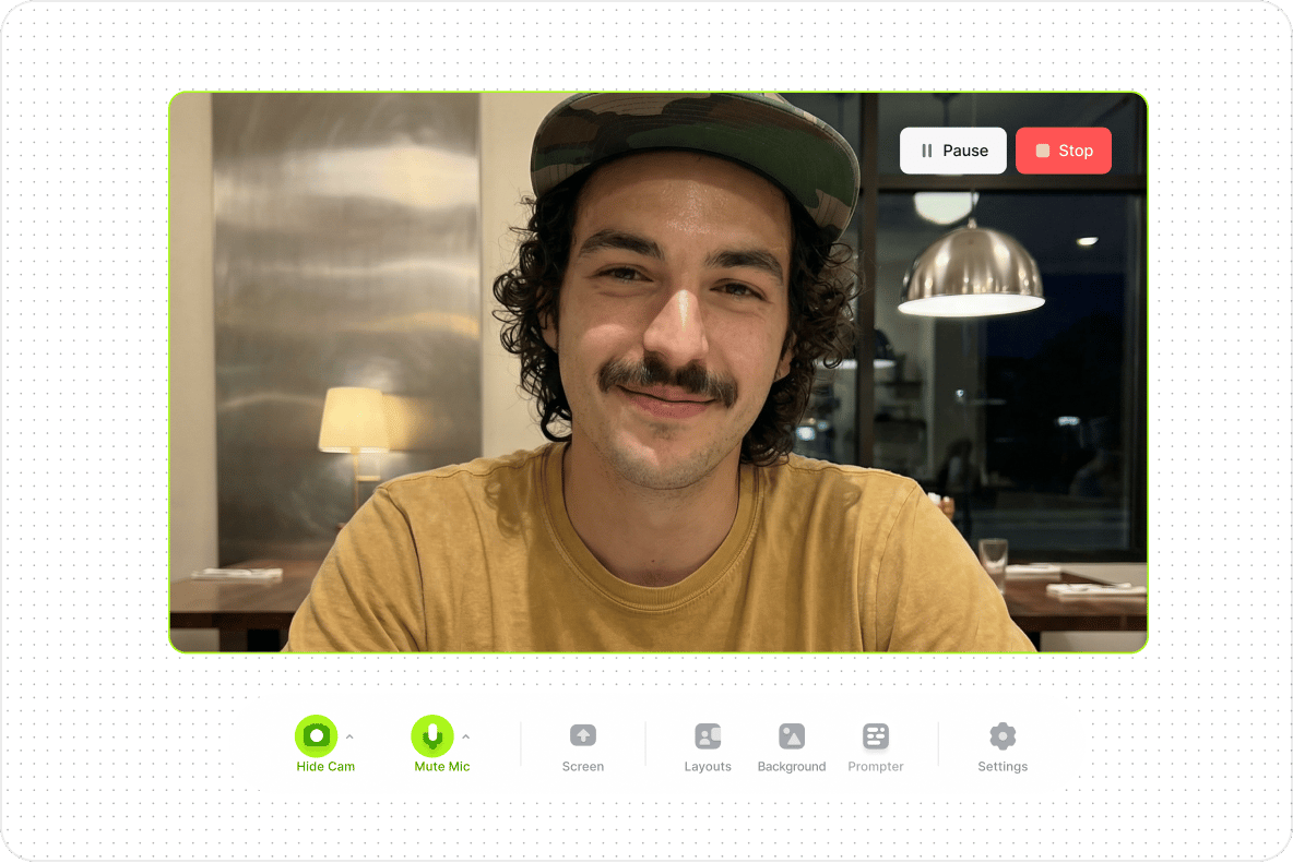 Man wearing a camo hat using an online screen recorder dashboard with pause and stop controls for content creation.