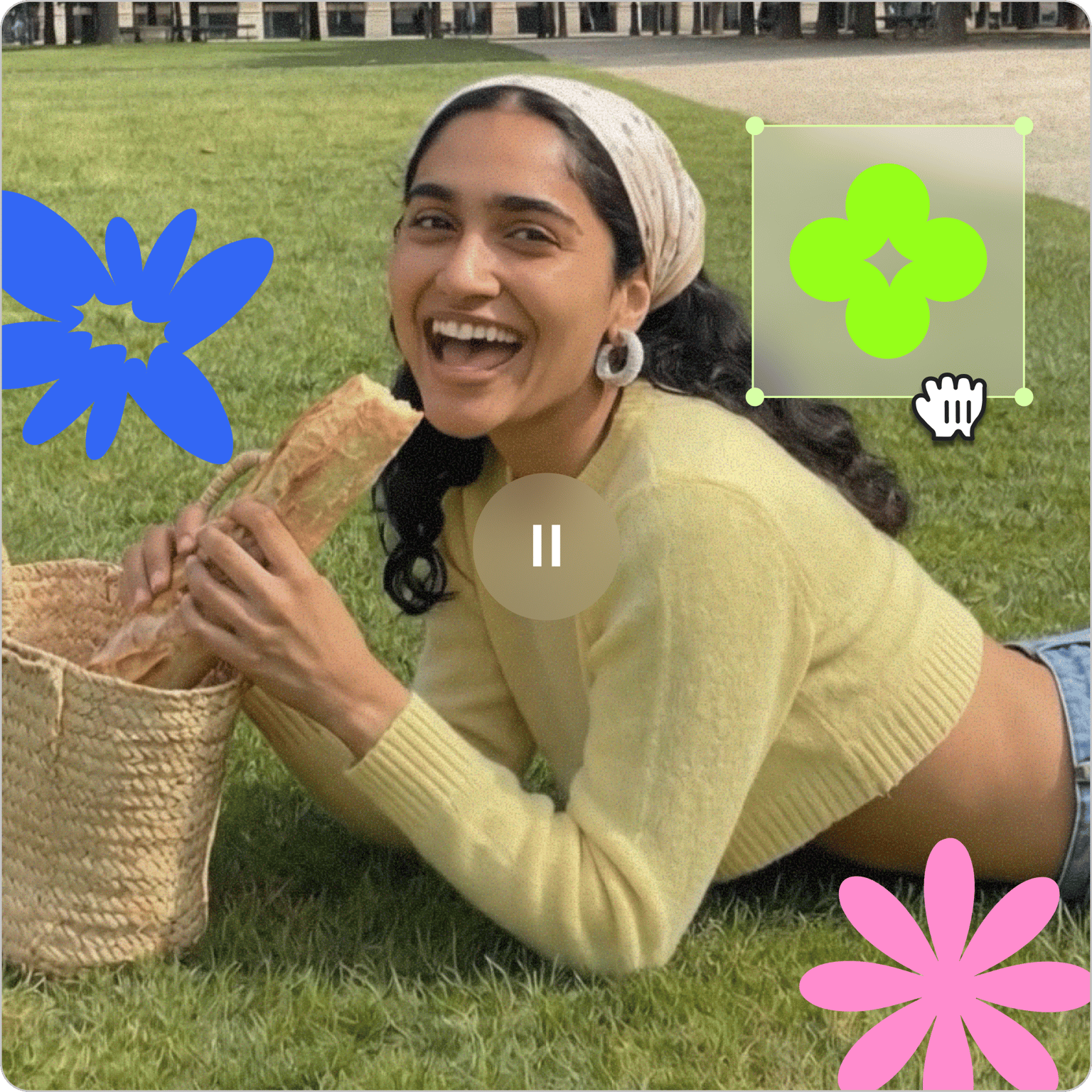 Woman laughing on grass with a baguette and flower graphics for the Animated Stickers interface.