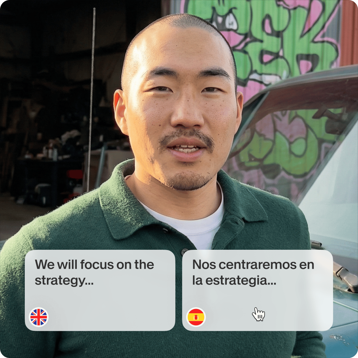 Man in a green shirt beside a vehicle with digital panels showing a translation from English text to Spanish text.