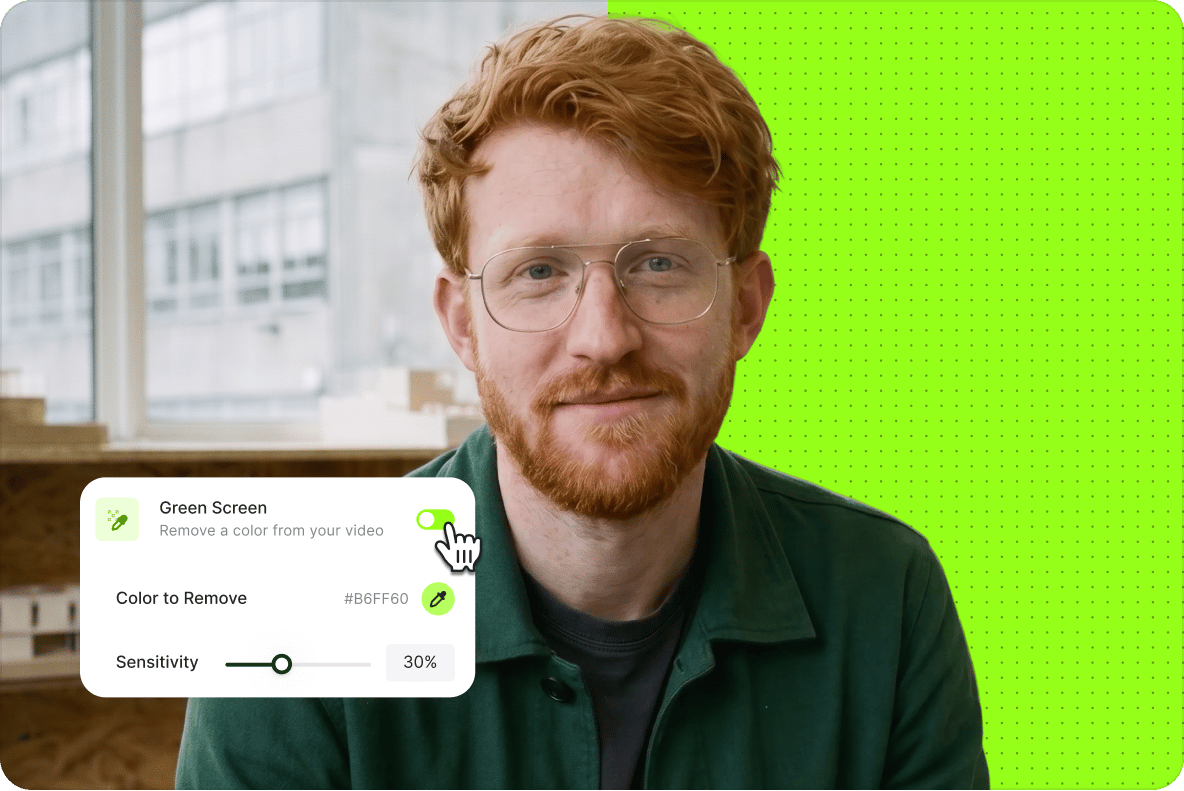 Redheaded man in glasses using a green screen editor settings menu to remove a background color from his video.