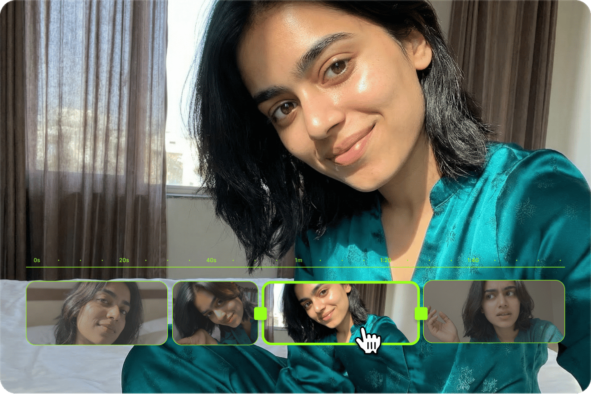 Woman in a teal silk outfit on a video editing timeline workspace creating professional looking video content.