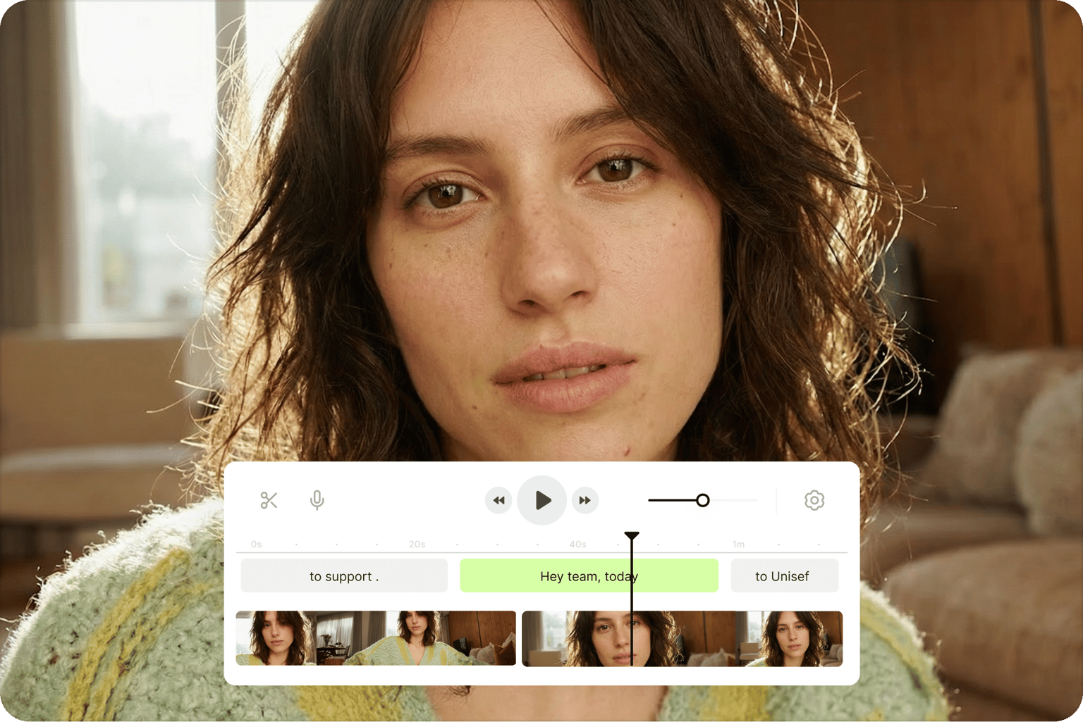 Video editor interface showing a close up of a woman with a media player timeline and subtitle blocks overlaying the screen