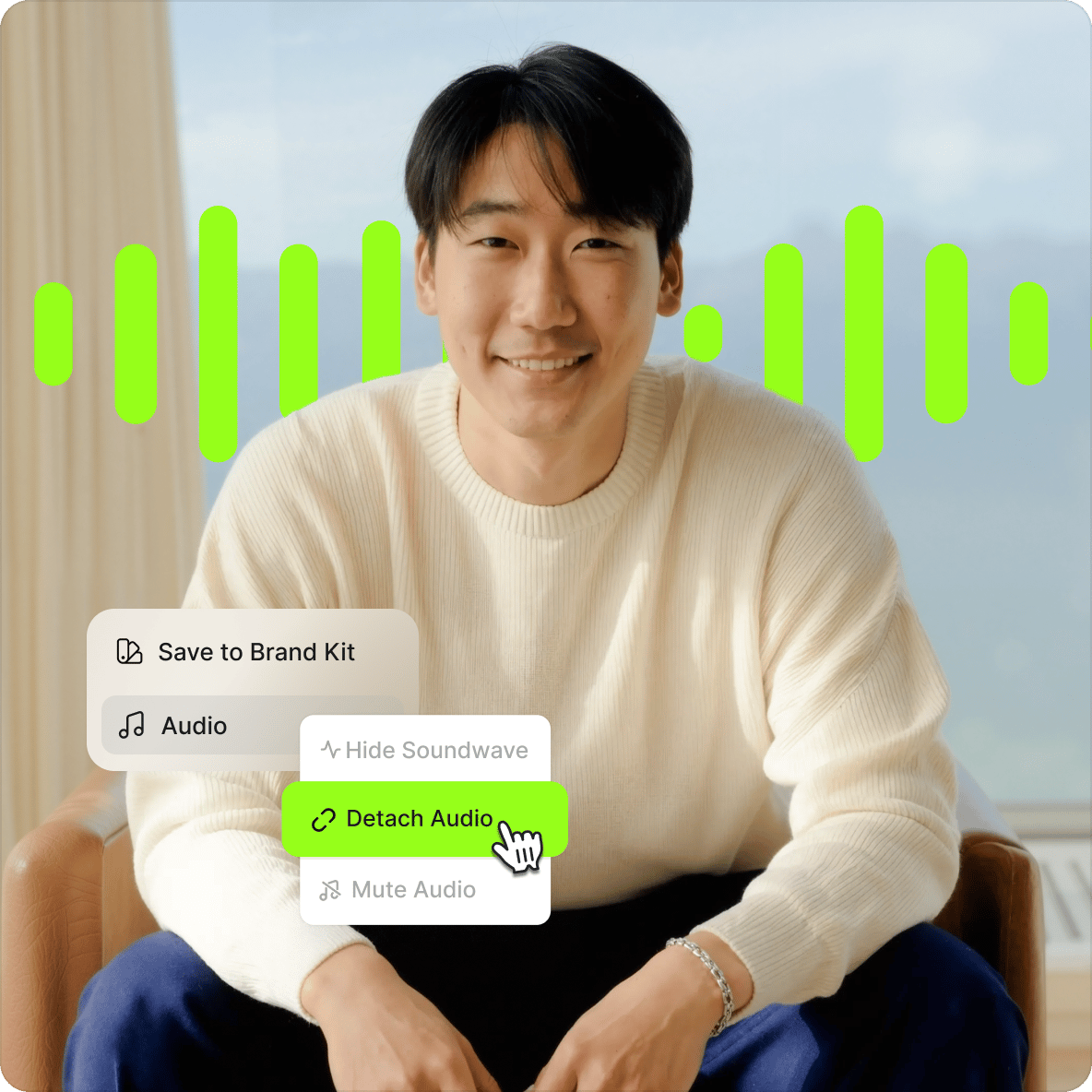 Smiling man in a cream sweater with a lime green soundwave graphic and a menu highlighting the detach audio tool.