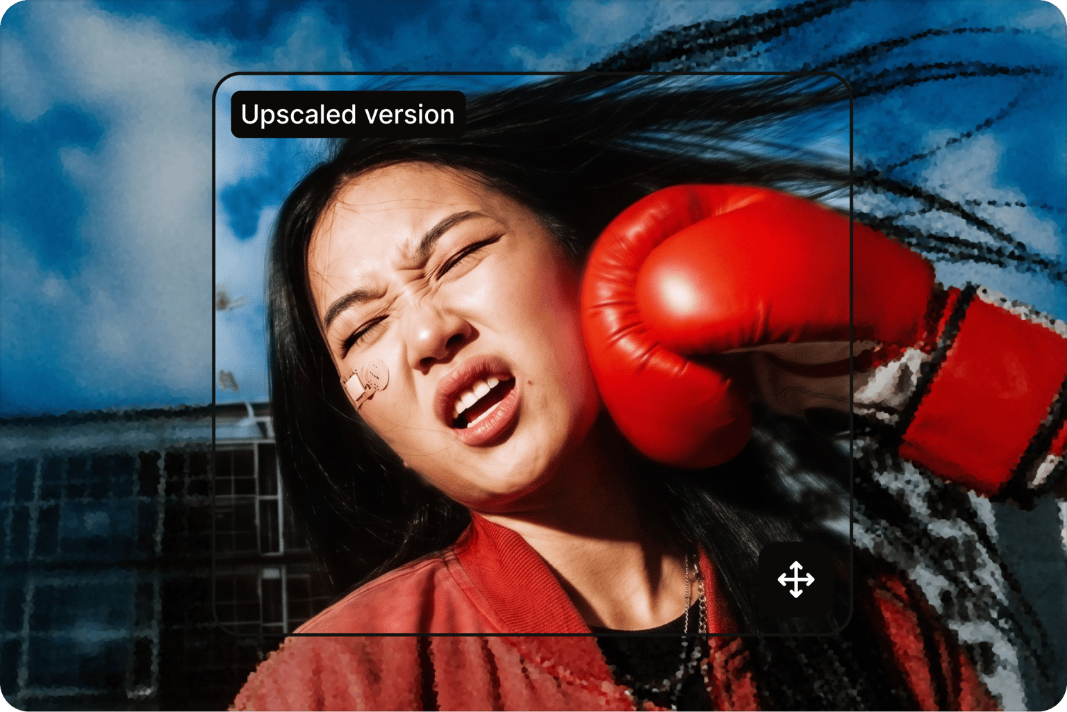 Upscaled version window over a pixelated photo of a woman taking a punch from a red boxing glove, with expand icon