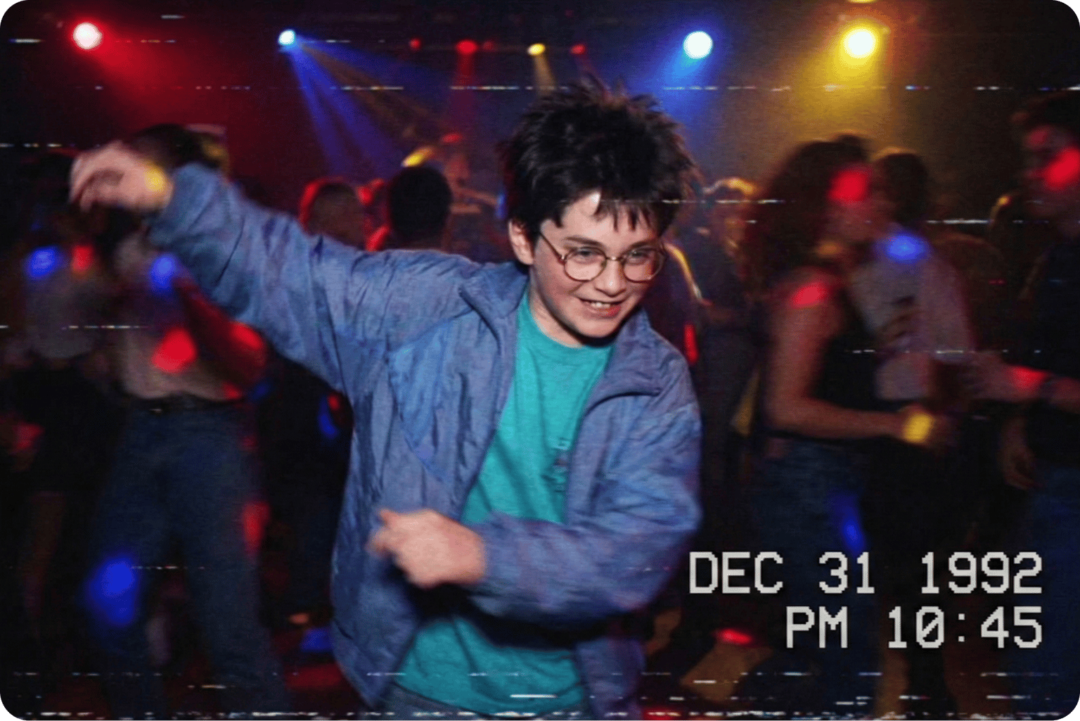 Funny video maker image featuring a retro video recording of a young boy in glasses dancing at a party