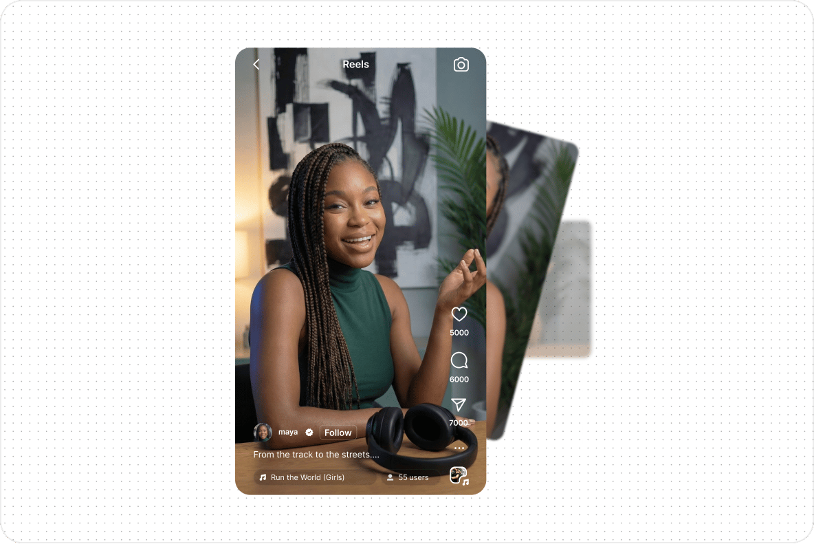 A smartphone interface displaying a social media video of a smiling woman with headphones on her desk.