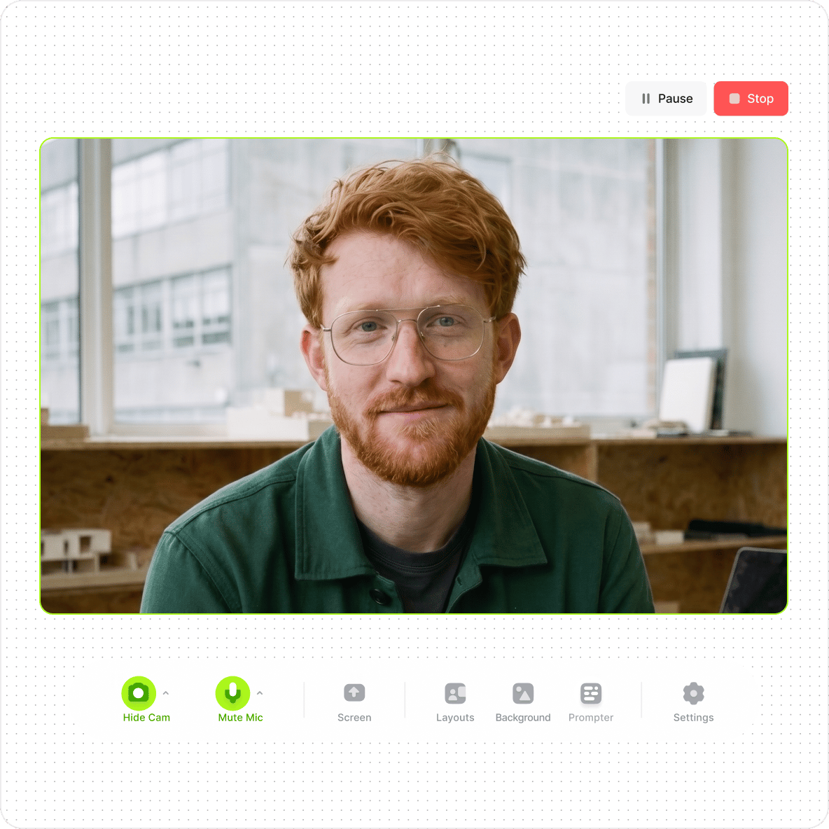 Redheaded man in glasses recording content using a free desktop screen recorder with camera and mic control tools.