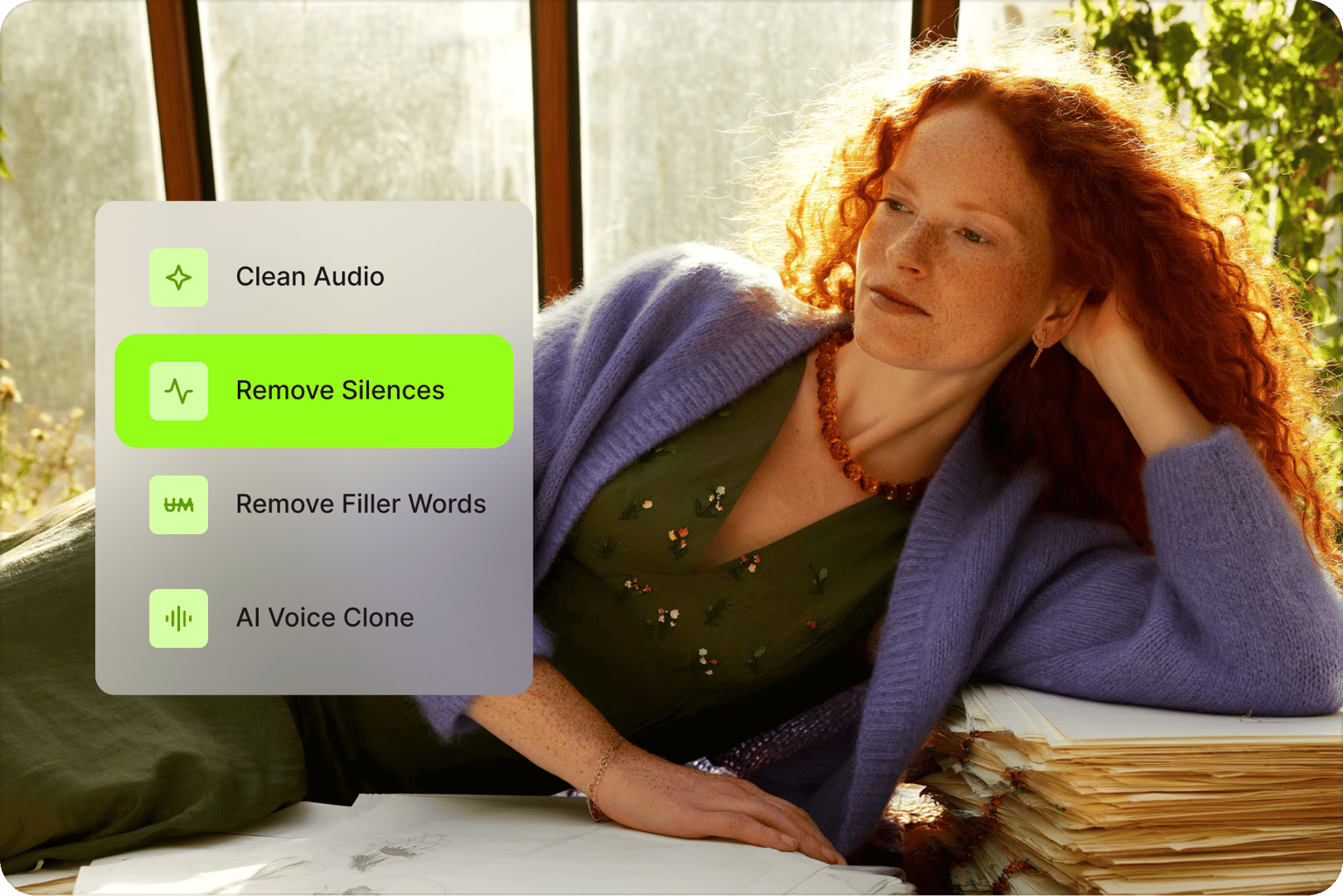 Auto video editor menu highlighting remove silences over a video of a red haired woman in a purple sweater