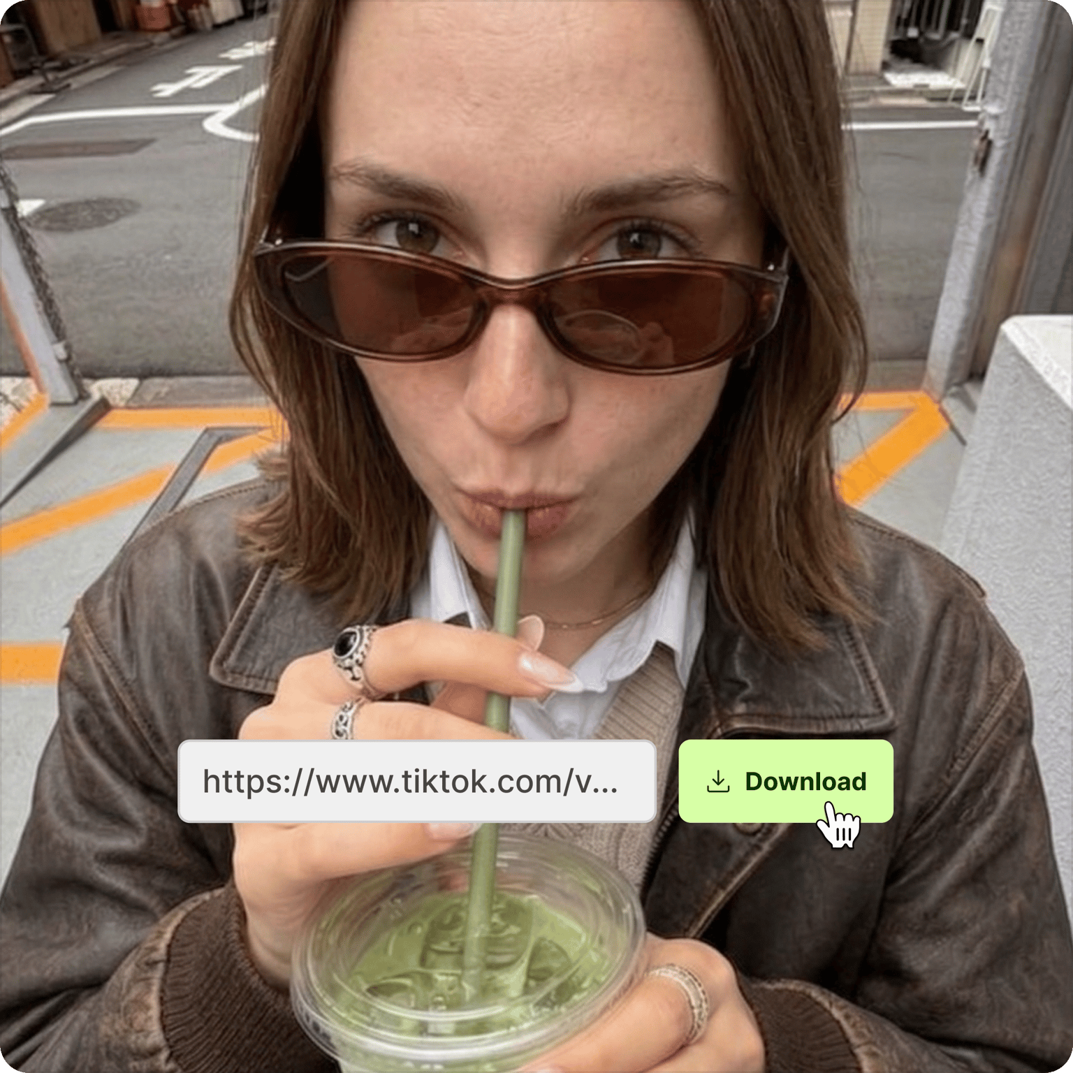 TikTok downloader interface showing a woman in sunglasses drinking green iced tea with a download URL bar overlay