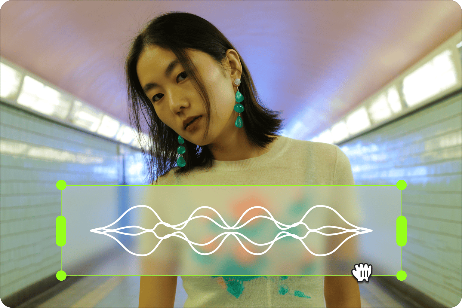 Music visualizer showing a cursor resizing a white audio waveform over a video of a woman in a tunnel
