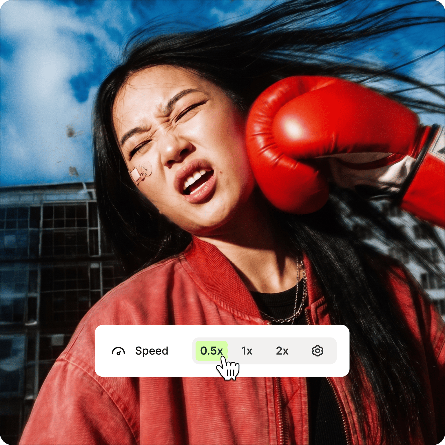 Video speed controller showing a woman being hit by a boxing glove with speed options from 0.5x to 2x.