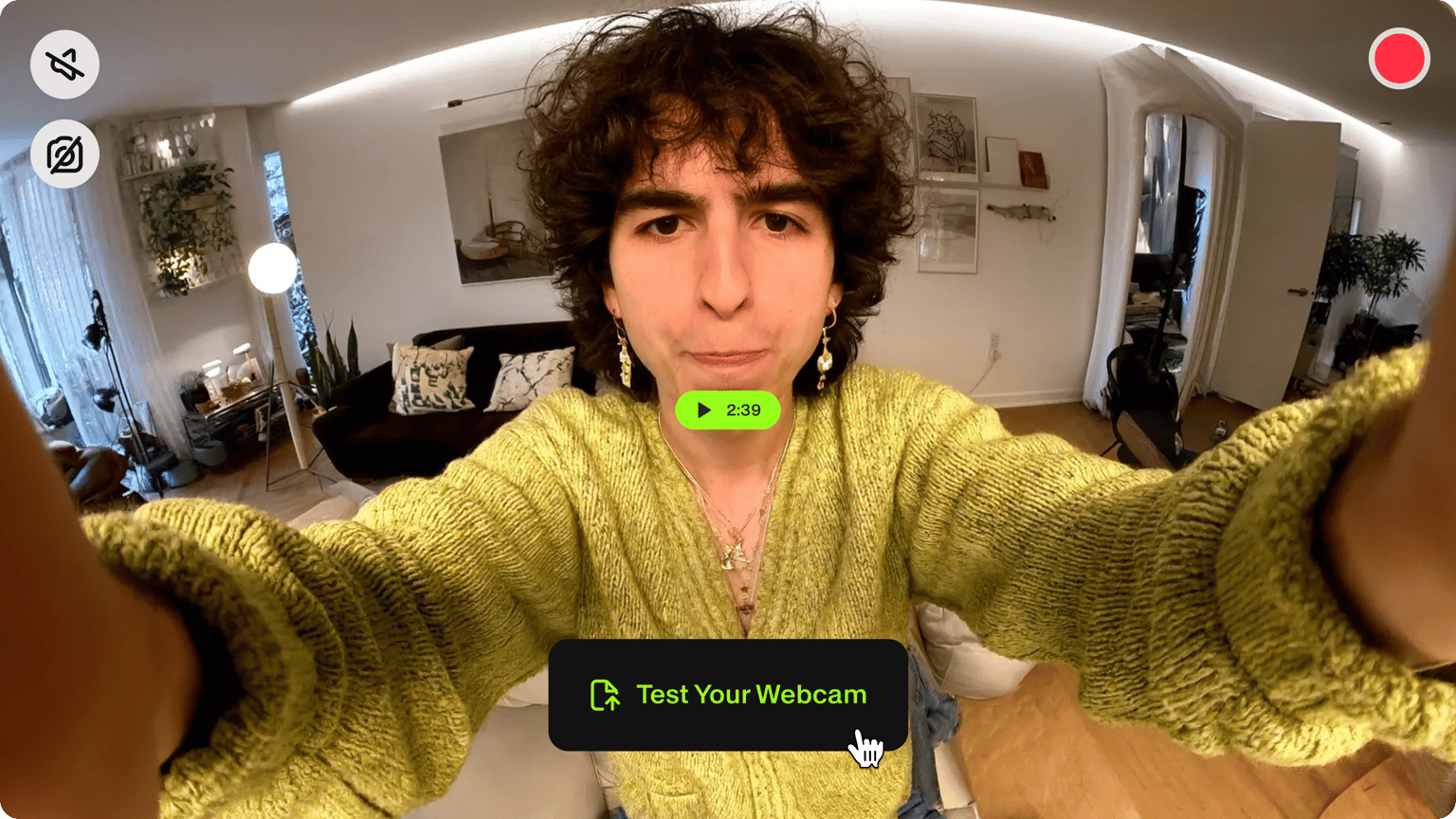 Test your webcam demo thumbnail showing cursor clicking button on fisheye video of person reaching toward the camera