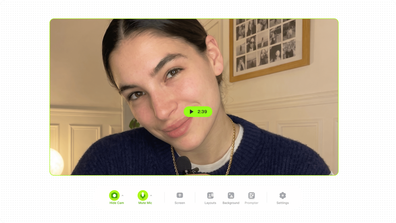 Close up of a smiling woman in a webcam recording frame with recorder settings and menu options below.